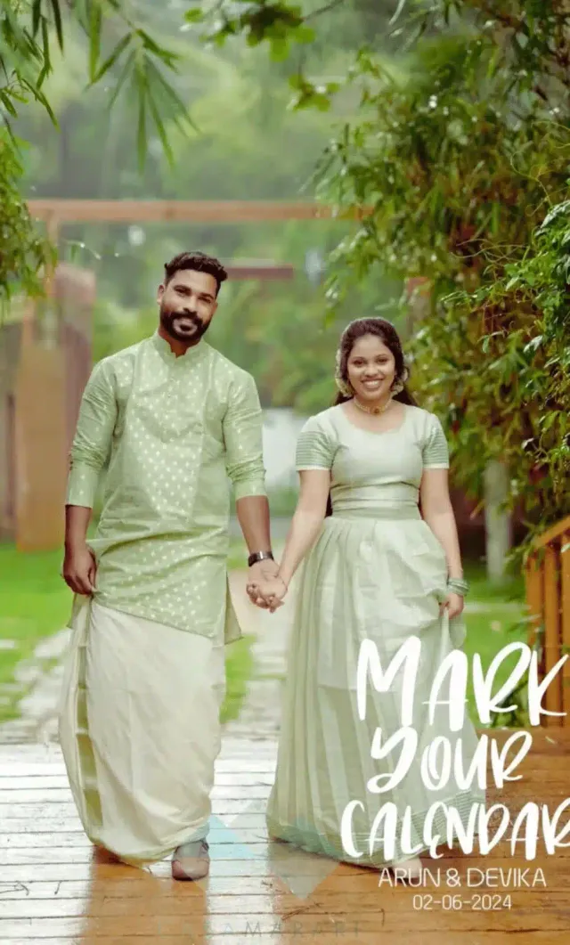 Couple in traditional Kerala attire walking hand in hand in the garden